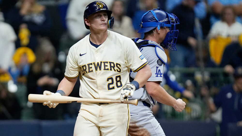 Brewers hitter in postseason action Milwaukee Brewers hitter preparing at the plate during postseason baseball
