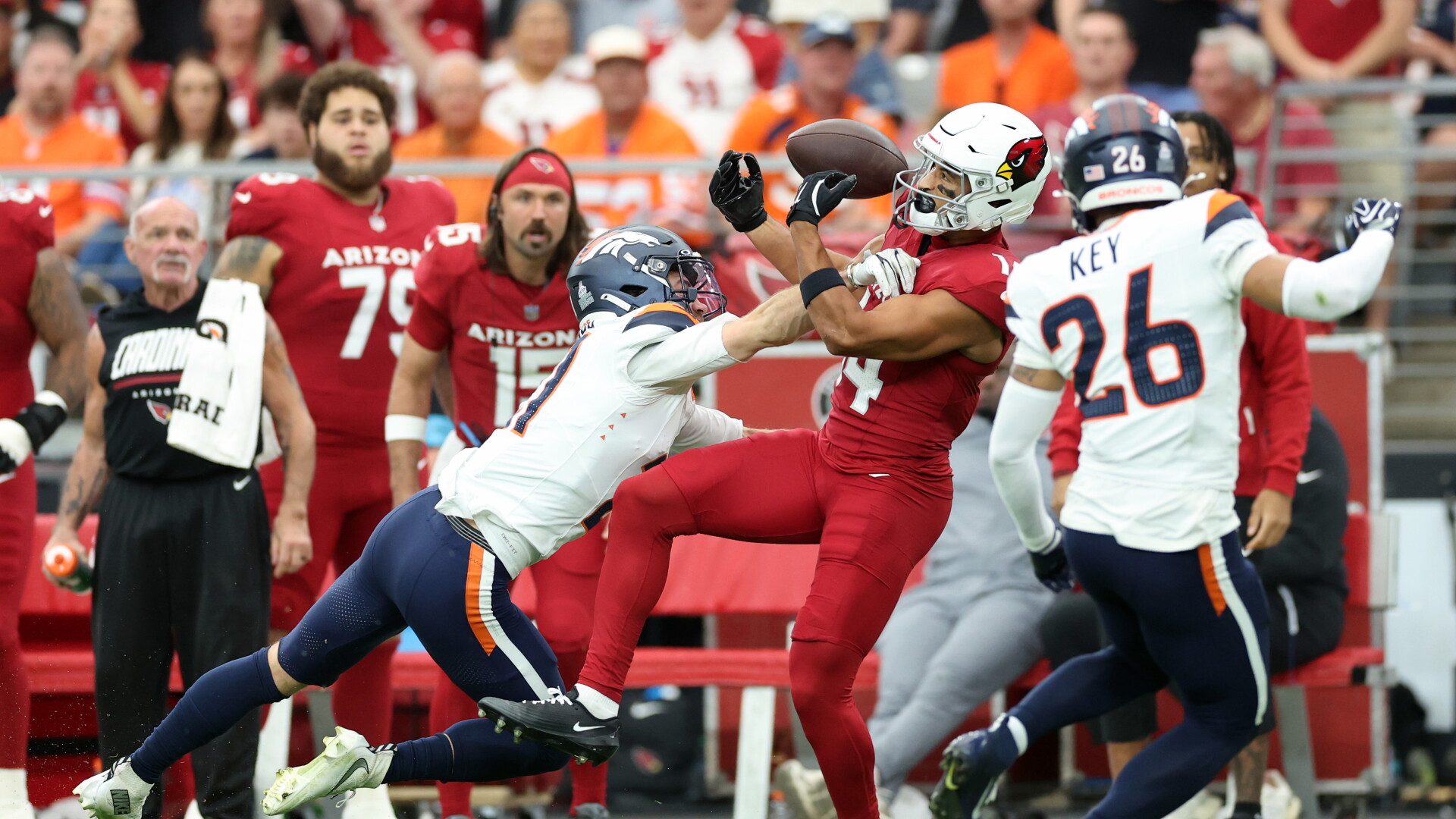 Broncos up 13-6 at halftime in Arizona