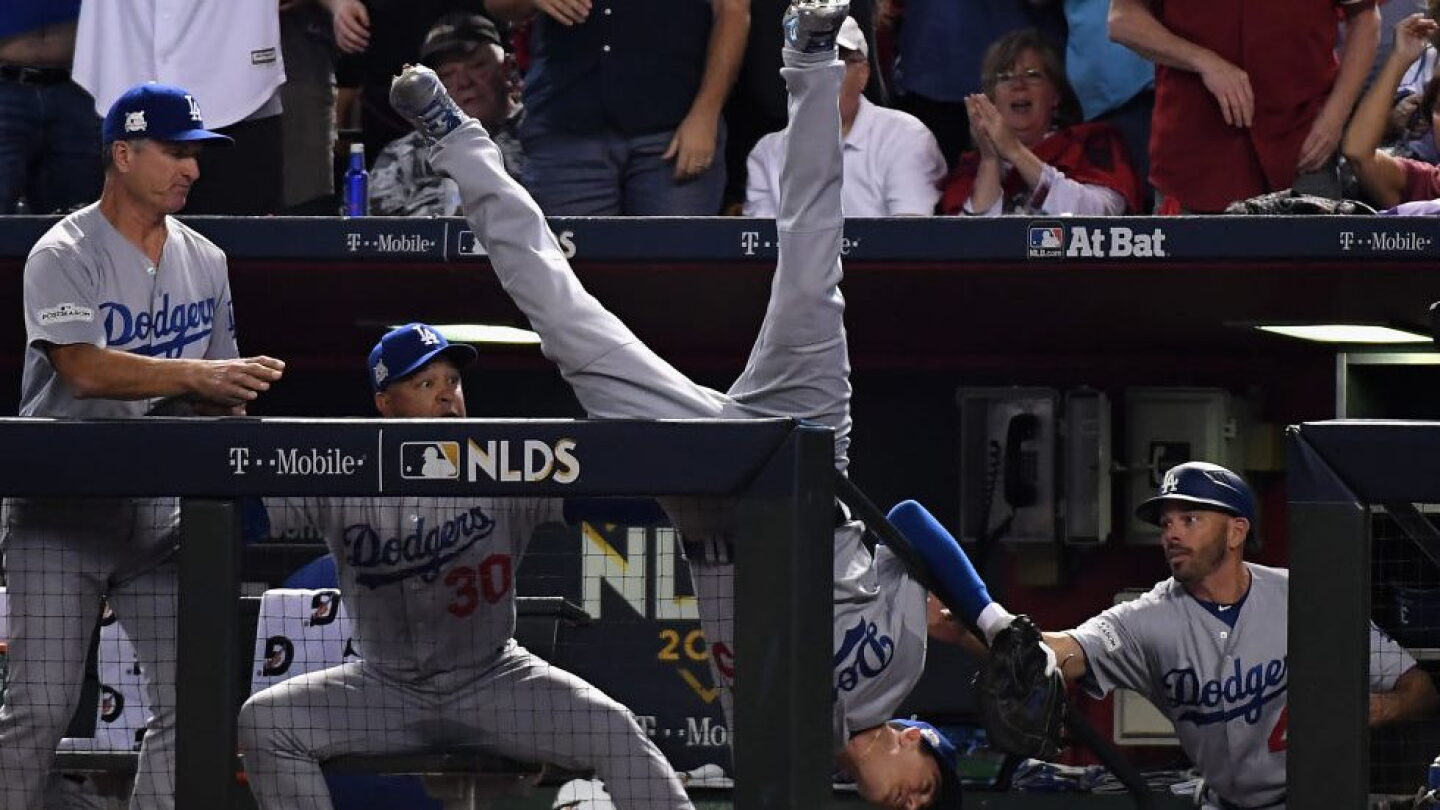 Cody Bellinger made a great flip-over-the-dugout-rail catch last night ...