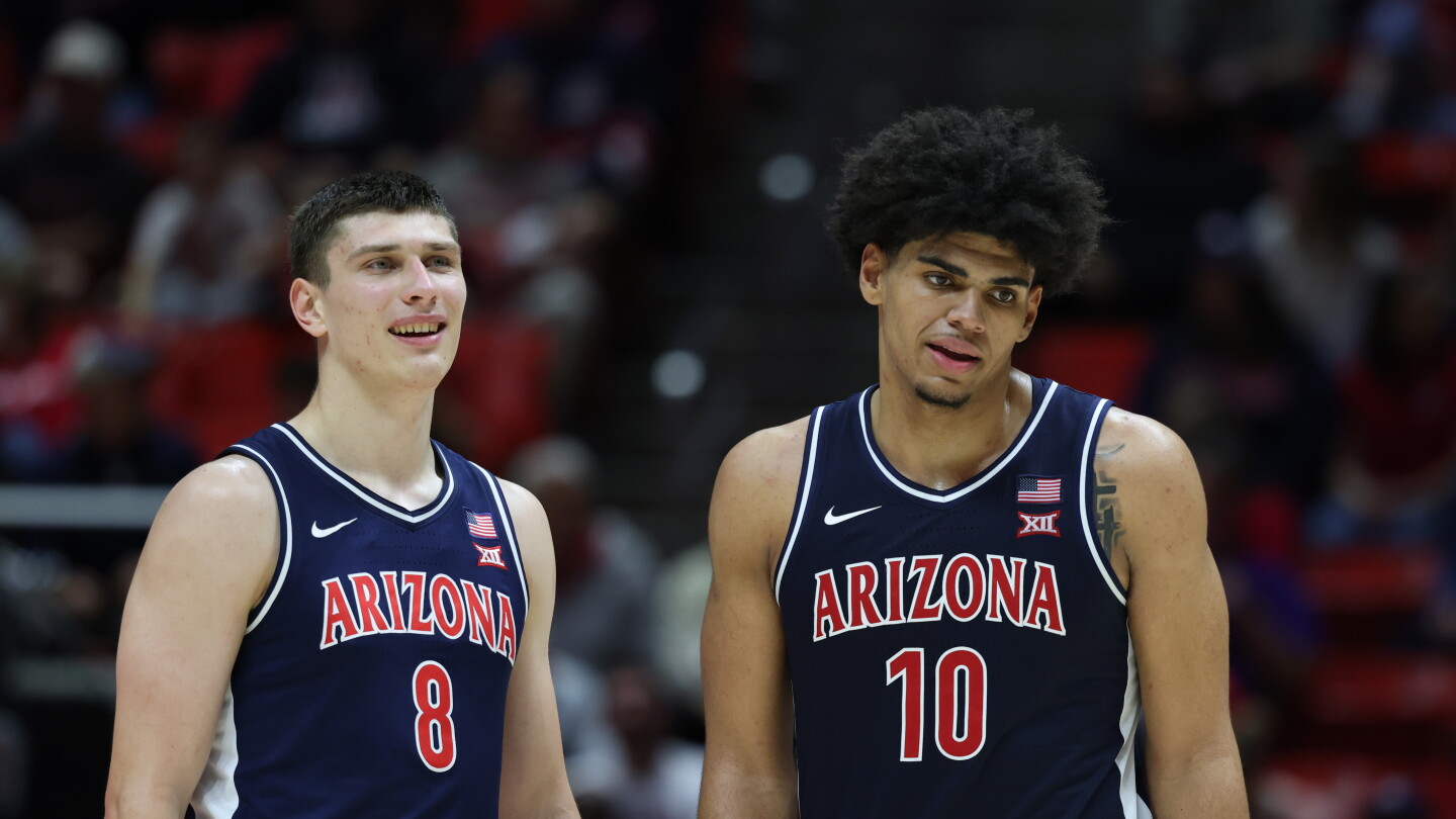 Arizona holds No. 1 spot over Michigan by single point in one of the closest AP Top 25 races ever