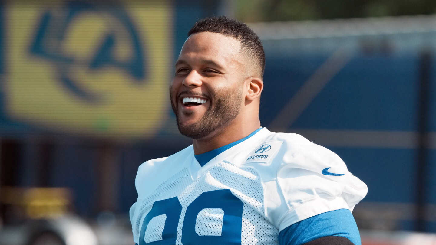 https://nbcsports.brightspotcdn.com/dims4/default/368a346/2147483647/strip/true/crop/7688x4325+0+0/resize/1440x810!/quality/90/?url=https%3A%2F%2Fnbc-sports-production-nbc-sports.s3.us-east-1.amazonaws.com%2Fbrightspot%2Fa1%2Fe5%2F647f4cb24d28b8c36e71f9657efe%2F2026-08-31t052606z-1131111933-mt1usatoday29700938-rtrmadp-3-nfl-los-angeles-rams-aaron-donald-press-conference.jpg