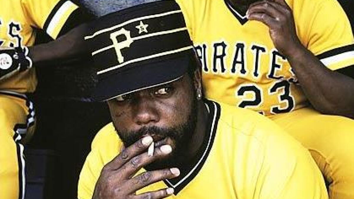 dave parker cigarette Parker, Pirates great and World Series champion, dies at 74 76 Dugout Smoking Stock Photos,