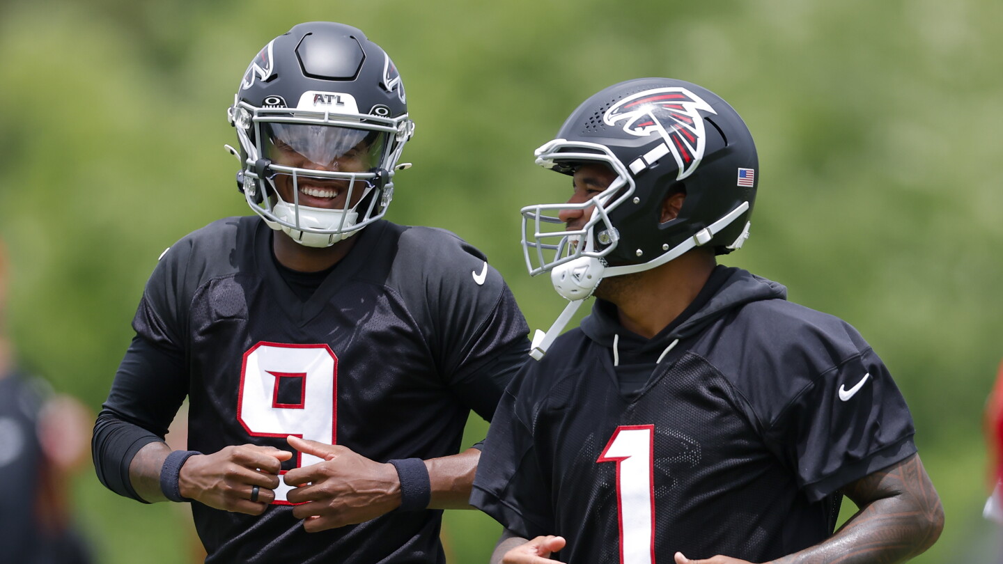 Tua Tagovailoa won’t practice after injury “flared up,” Michael Penix won’t do team drills