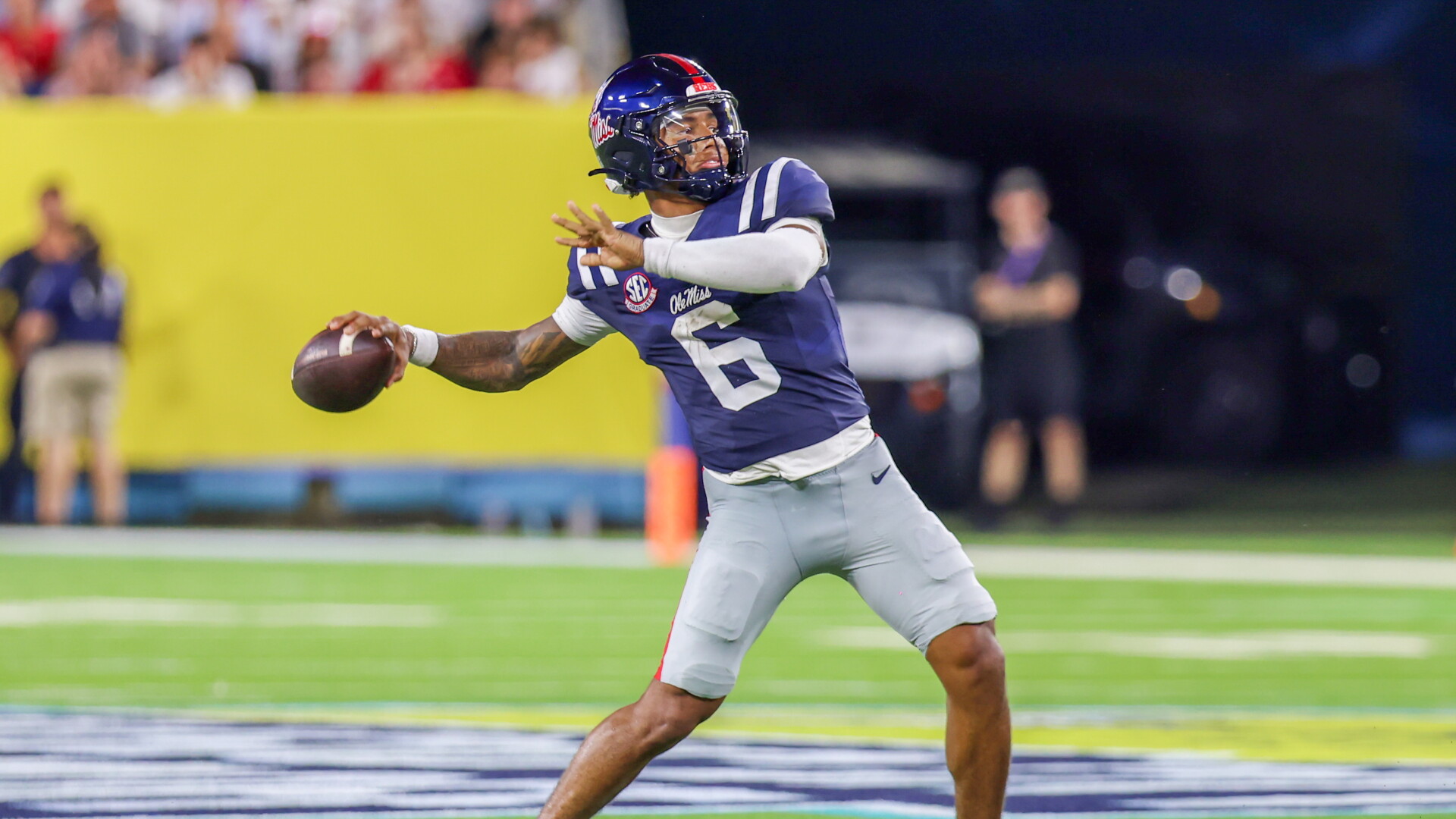 Ole Miss QB Trinidad Chambliss passes for 336 yards, runs for 60 in 41-38 win in opener