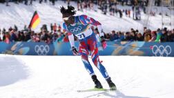 Image for Haiti's first Olympic cross-country skier celebrated by crowd after jubilant finish in men's skiathlon