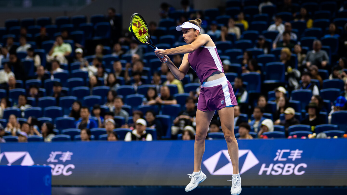 Open By Default Sign Elise Mertens beats Iga Swiatek to set up semifinal against Zheng ...