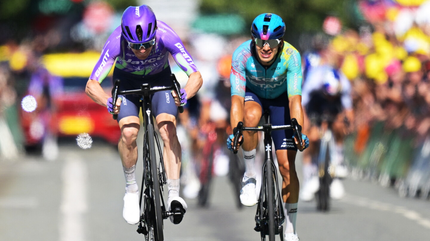 Mauro Schmid wins long 13th stage of the Tour and Pogacar safely keeps overall lead