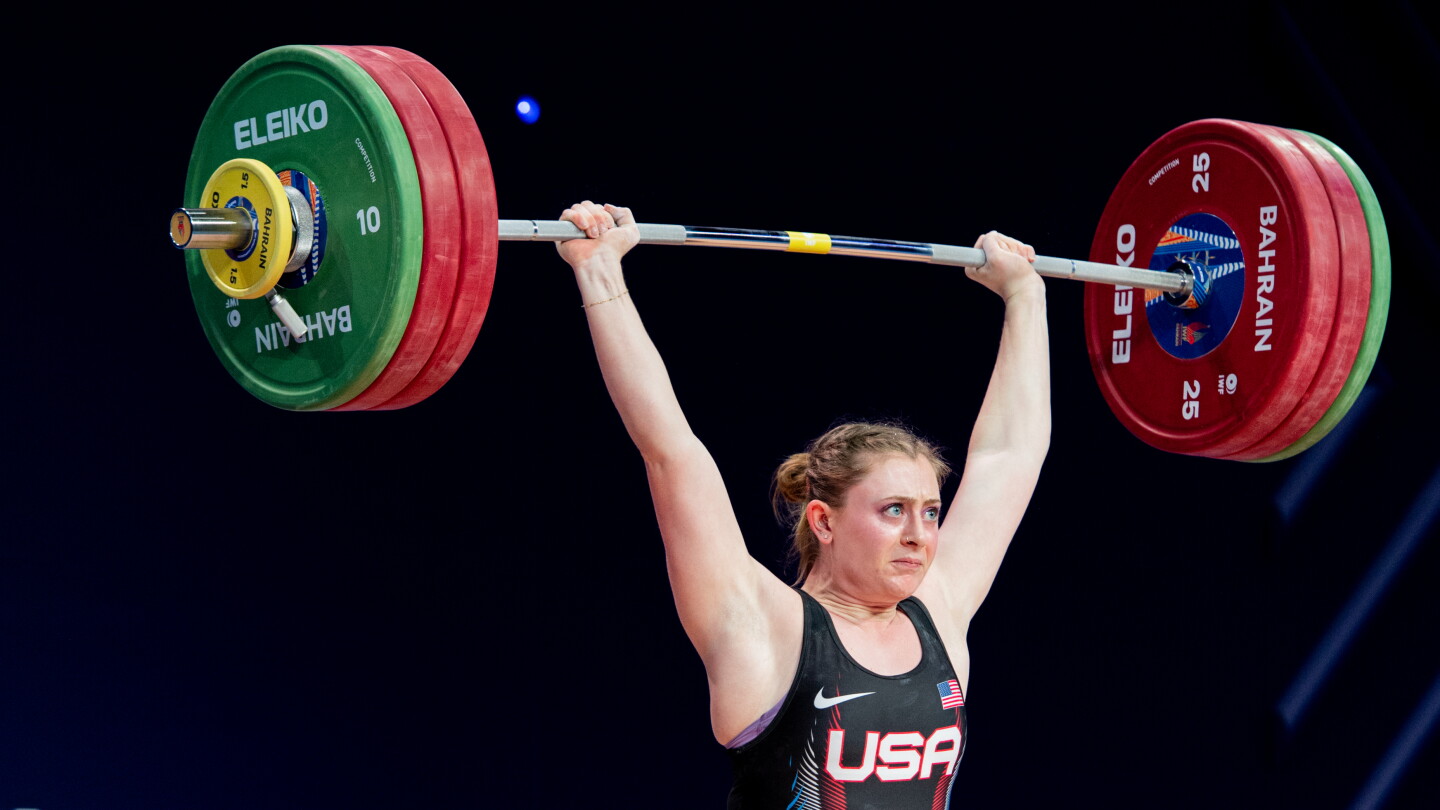 Lee Reeves Weight Olivia Reeves follows Olympic weightlifting gold with first world title ...