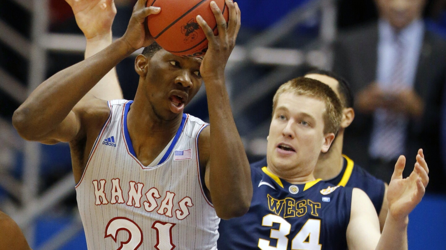Kansas' Joel Embiid dealt with lower back issues in high school as well
