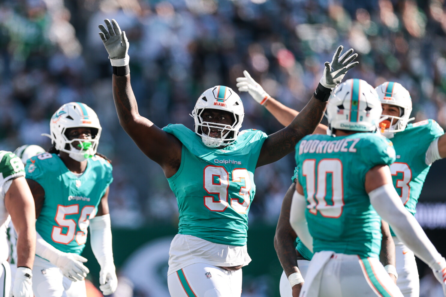 Dolphins hold off Jets 28-25 for their first win of the season