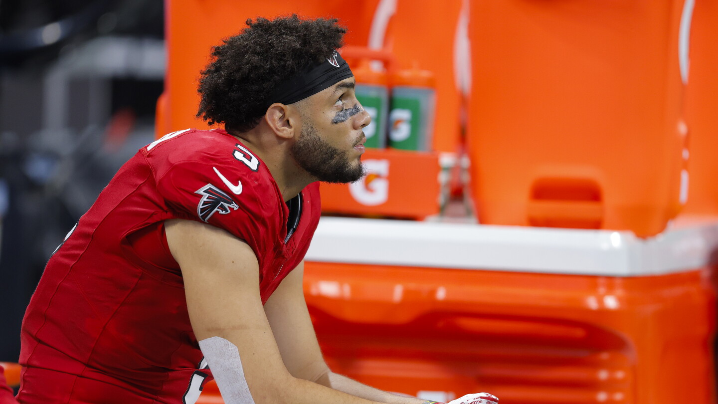 Drake London exchanges words with fan during Sunday's game