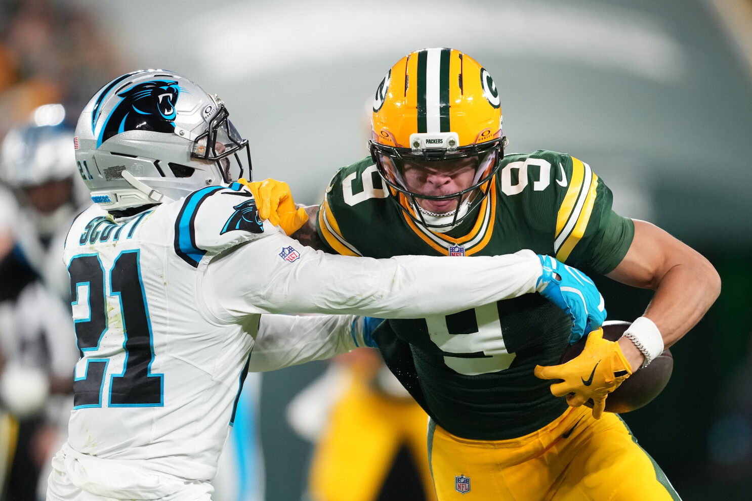 Christian Watson transported to hospital; Will Lee injures hamstring on same play