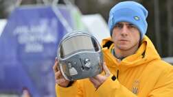 Image for Ukraine skeleton racer Vladyslav Heraskevych disqualified over 'helmet of remembrance'