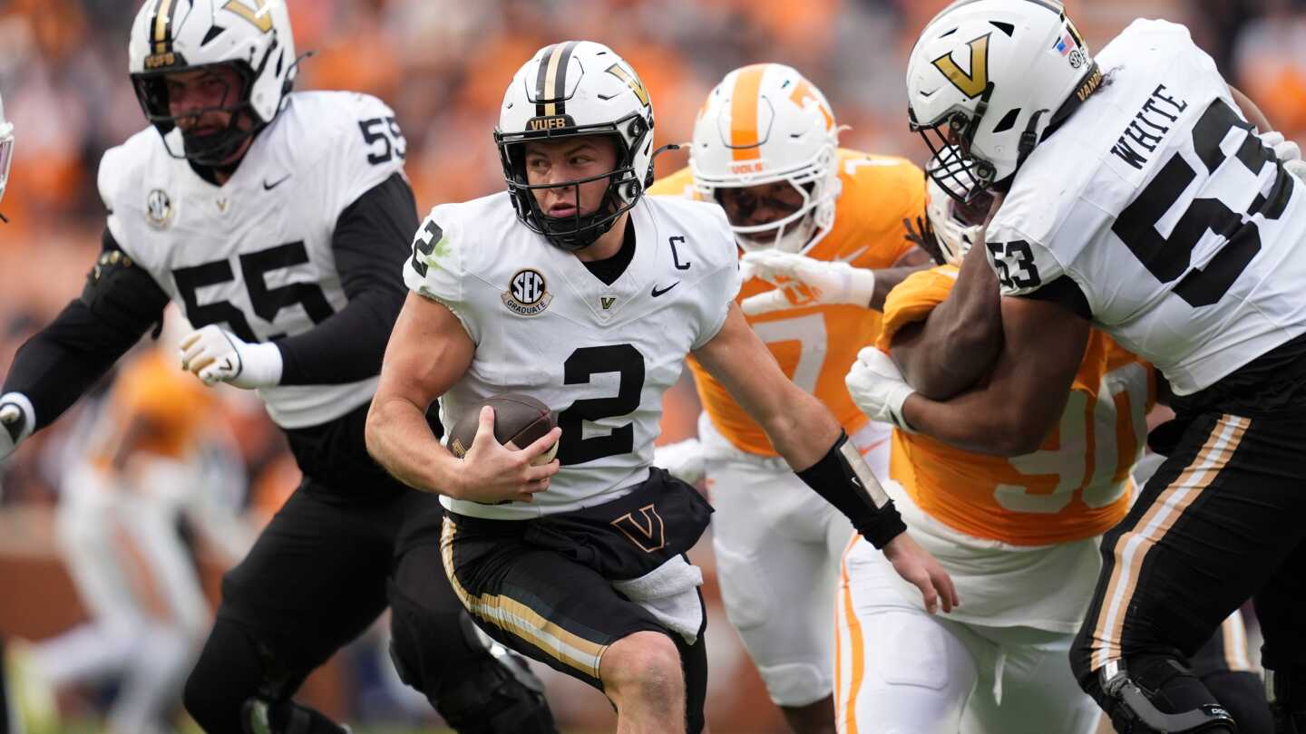 Pavia passes, runs for TDs as No. 12 Vanderbilt beats in-state rival No. 18 Tennessee 45-24
