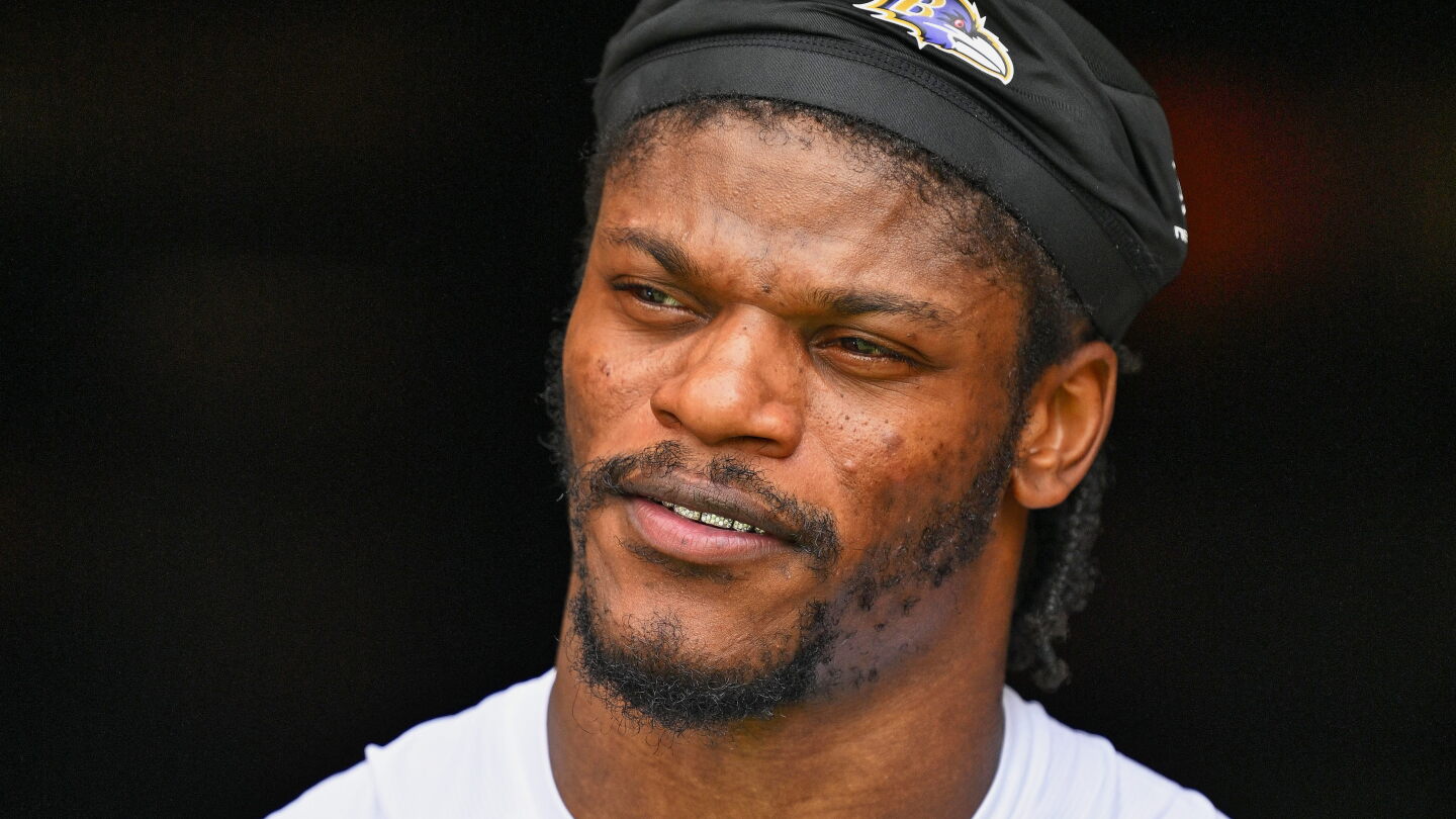Lamar Jackson, as before, declines to talk about his contract
