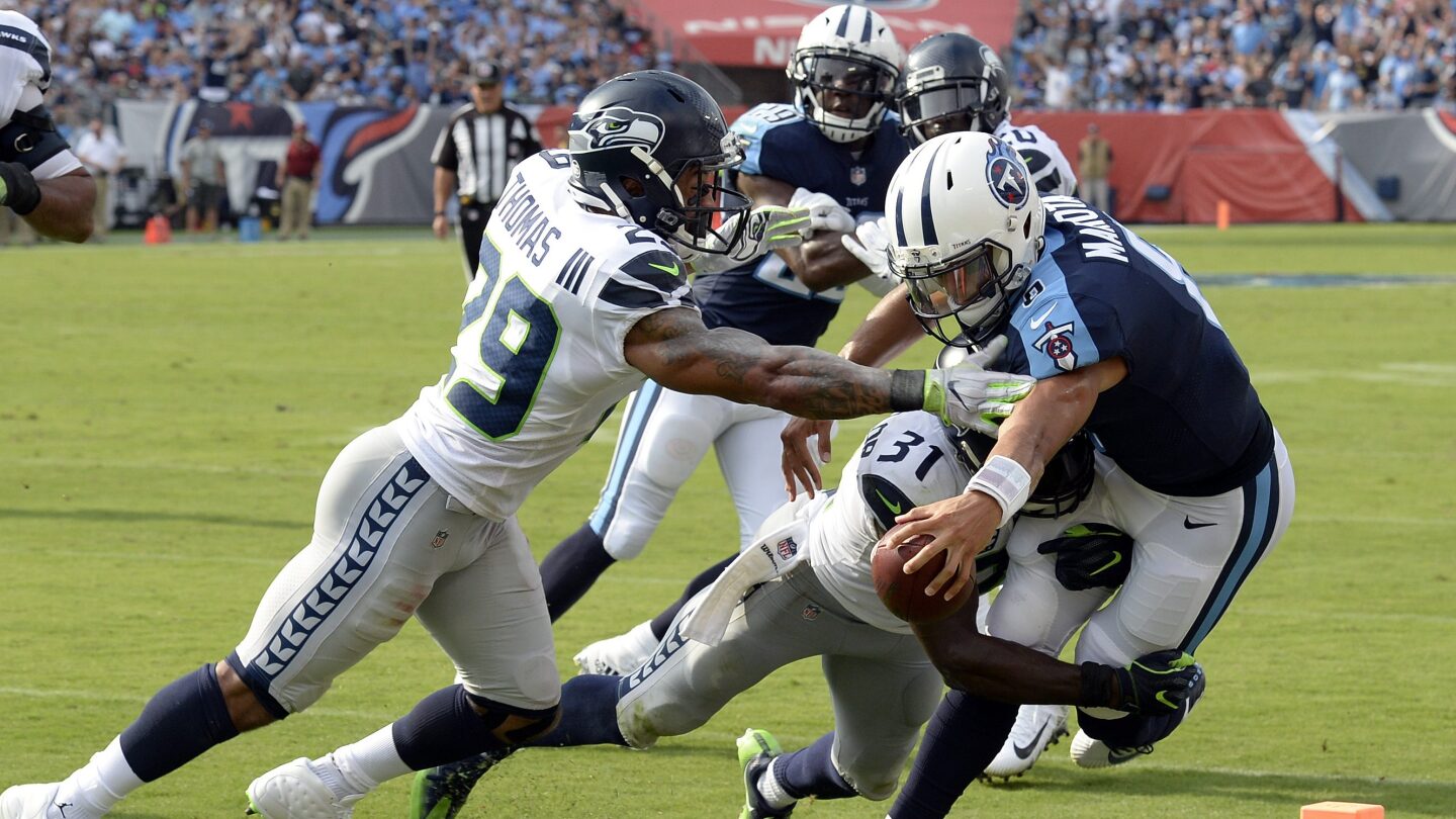 Richard Sherman hits Marcus Mariota late as Seahawks-Titans game gets ...