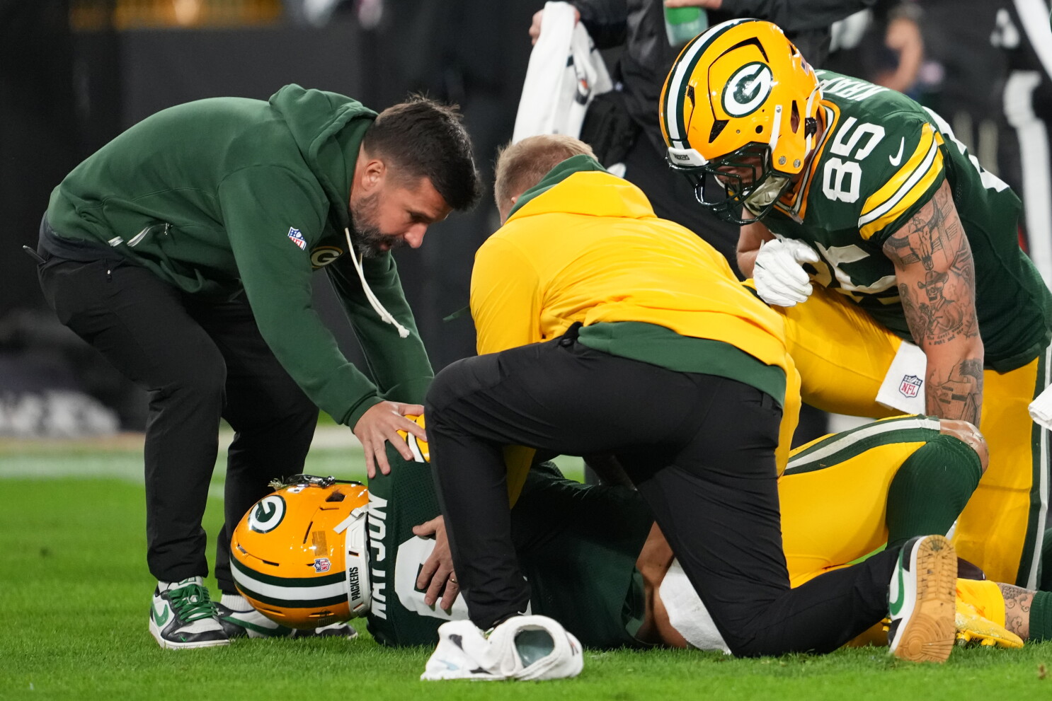 Christian Watson cleared, on his way back to Lambeau from hospital