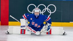 Image for Olympic hockey boards replaced with lighter color after player feedback